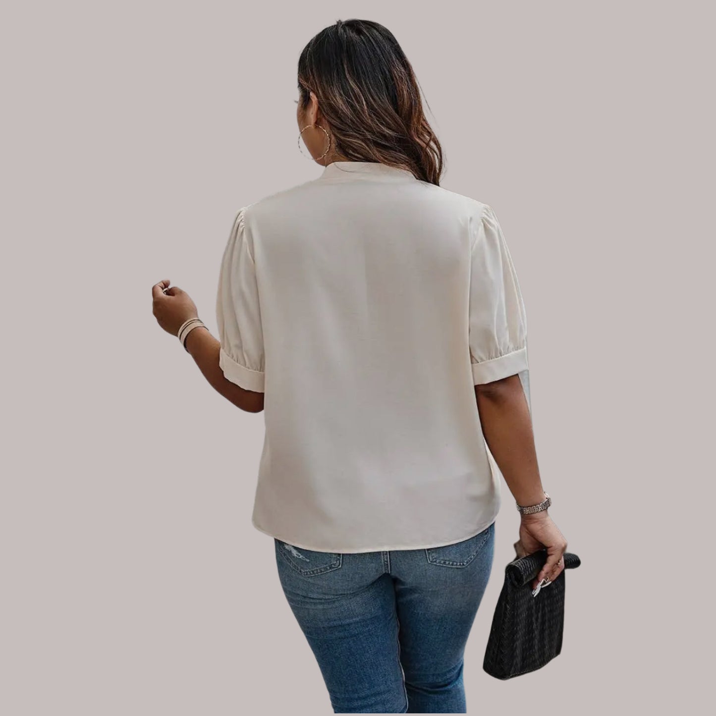 Blusa Nelly con cuello cruzado y mangas abullonadas