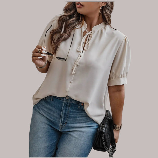 Blusa Nelly con cuello cruzado y mangas abullonadas